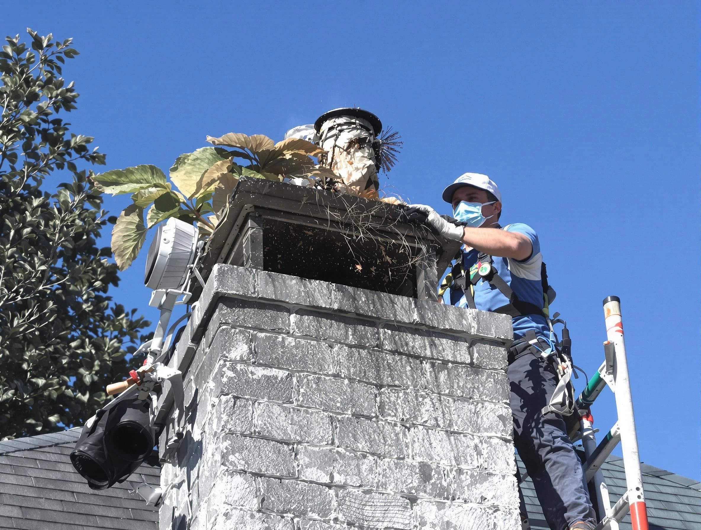 Barnegat Chimney Sweep specialist performing chimney cleaning in Barnegat, NJ