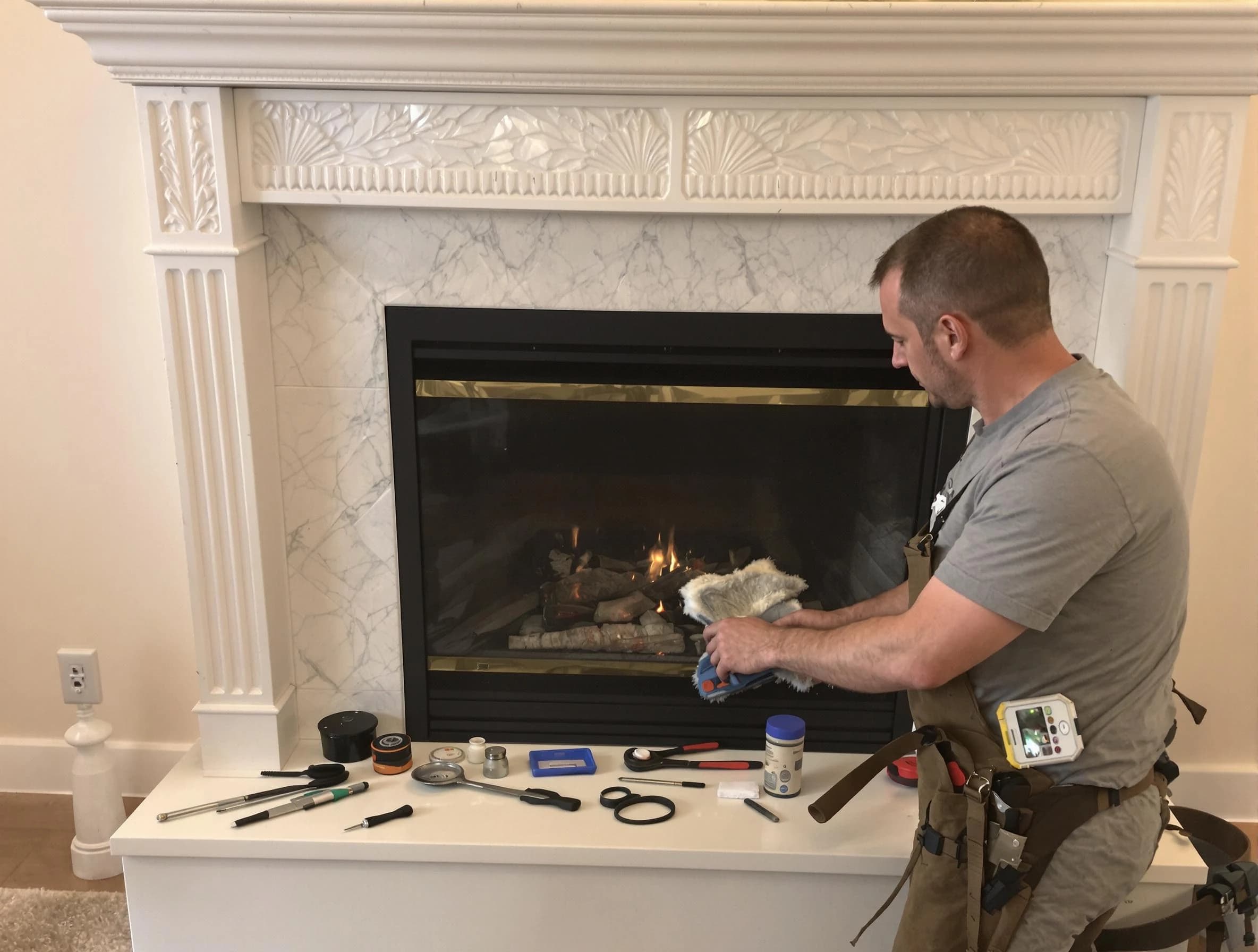 Barnegat Chimney Sweep performing fireplace maintenance in Barnegat, NJ